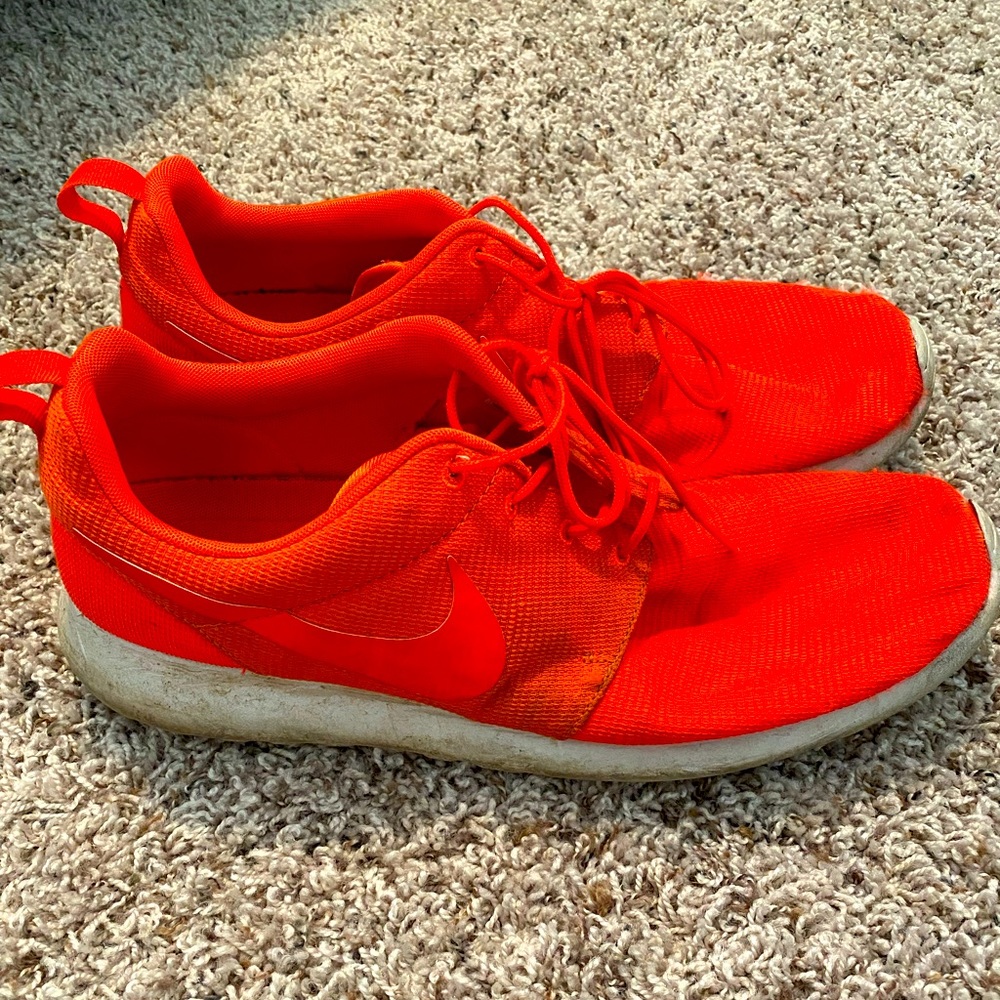 Orange Nike men’s shoes